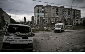 Sunaikinti automobiliai, 2022 m. birželio 18 d., Lysyčanskas. Nuotrauka: ARIS MESSINIS / AFP via Getty Images